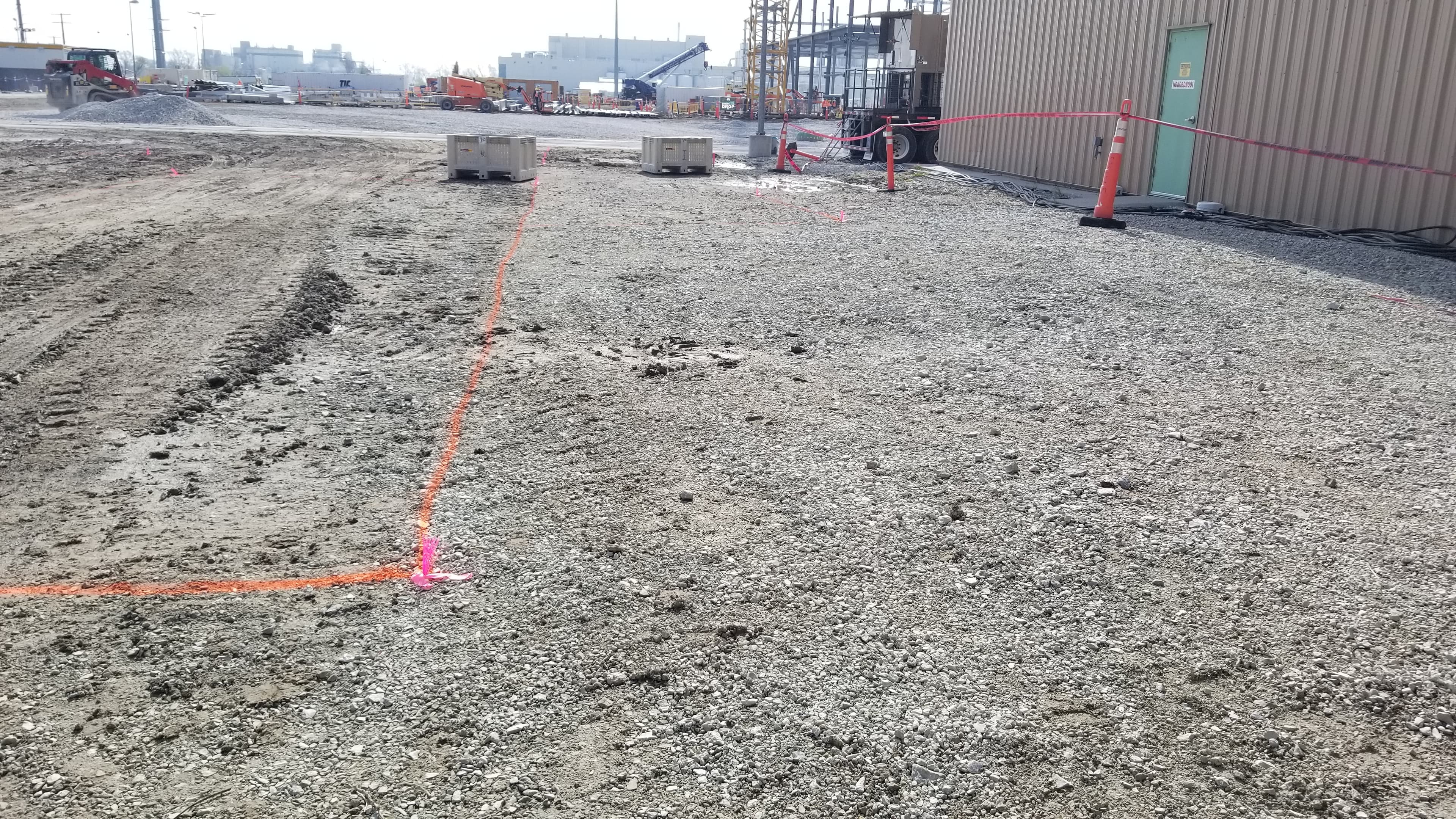 A third construction site with survey markers